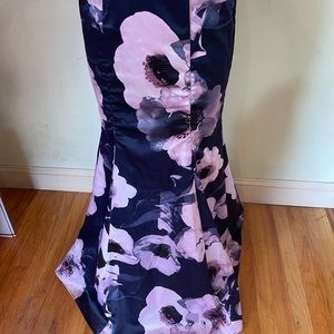 Xscape Classy and sexy Navy blue long gown with floral bottoms